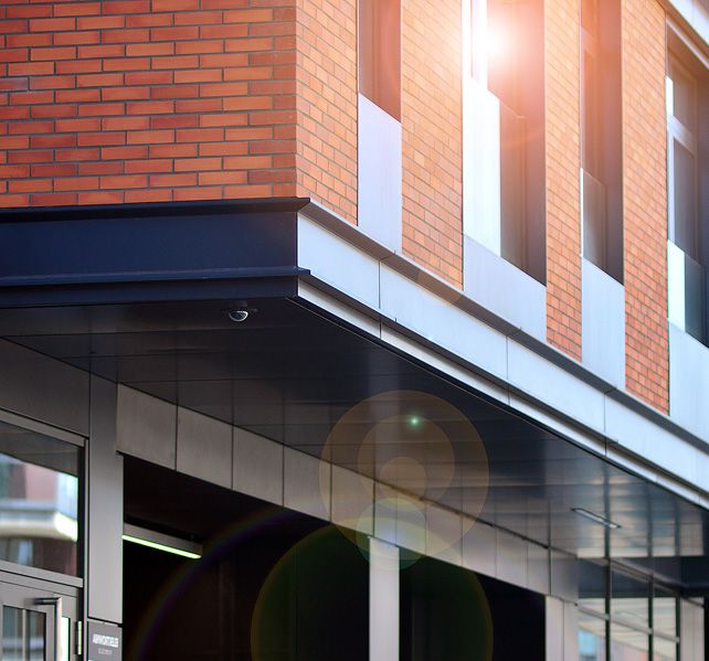 Brick commercial building with siding accents
