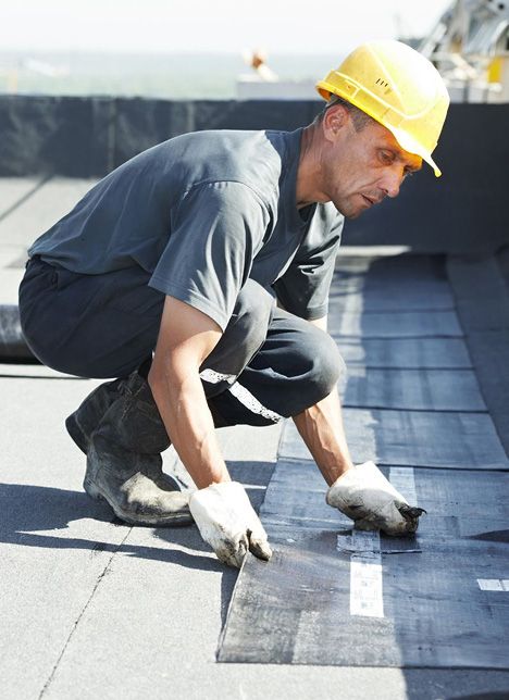 JS Exteriors worker on the job