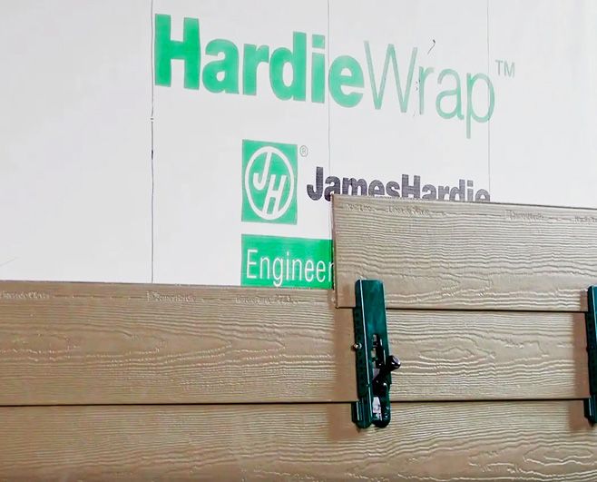 James Hardie siding being installed on a home