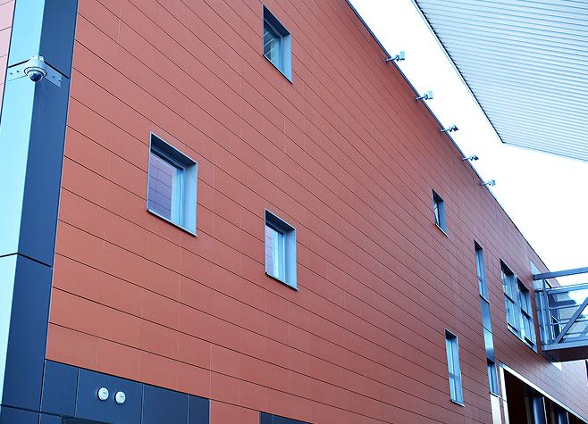 Commercial building with red siding