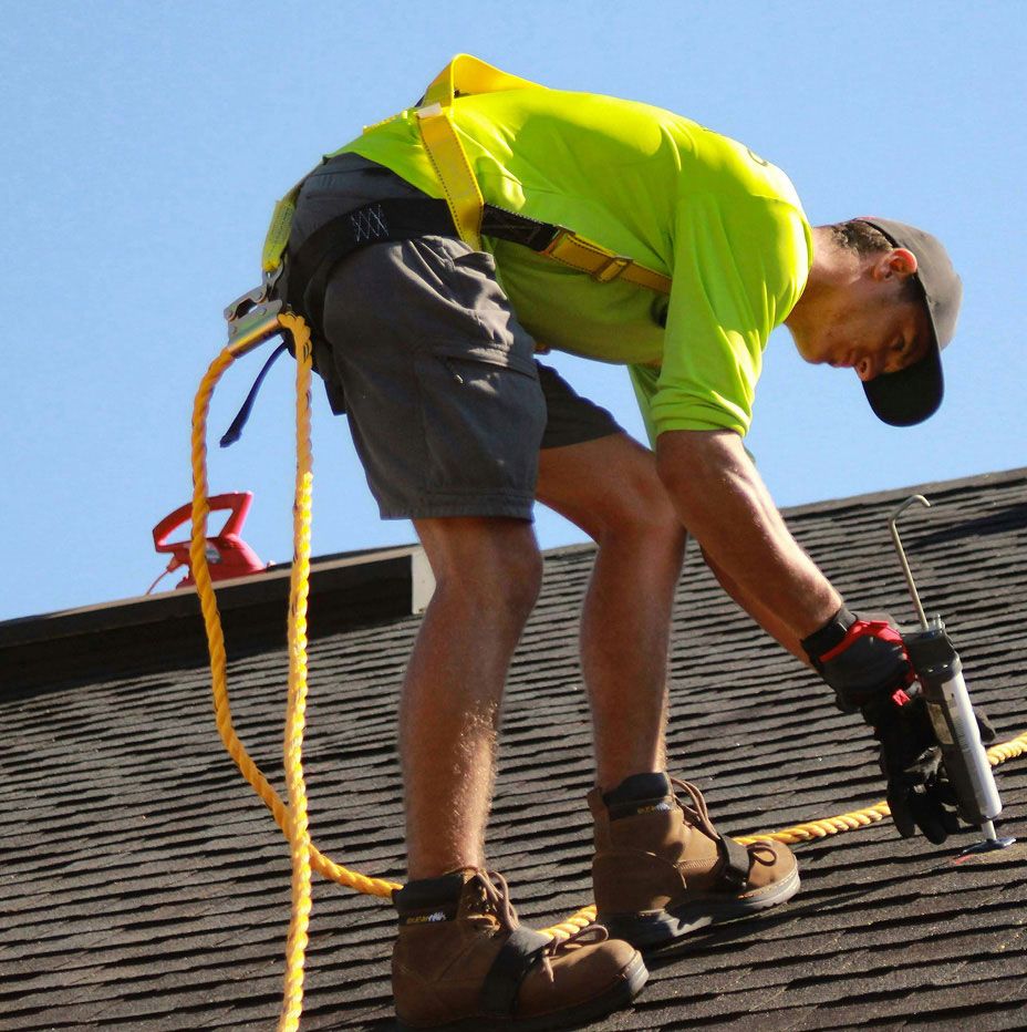 JS Exteriors worker on a job site