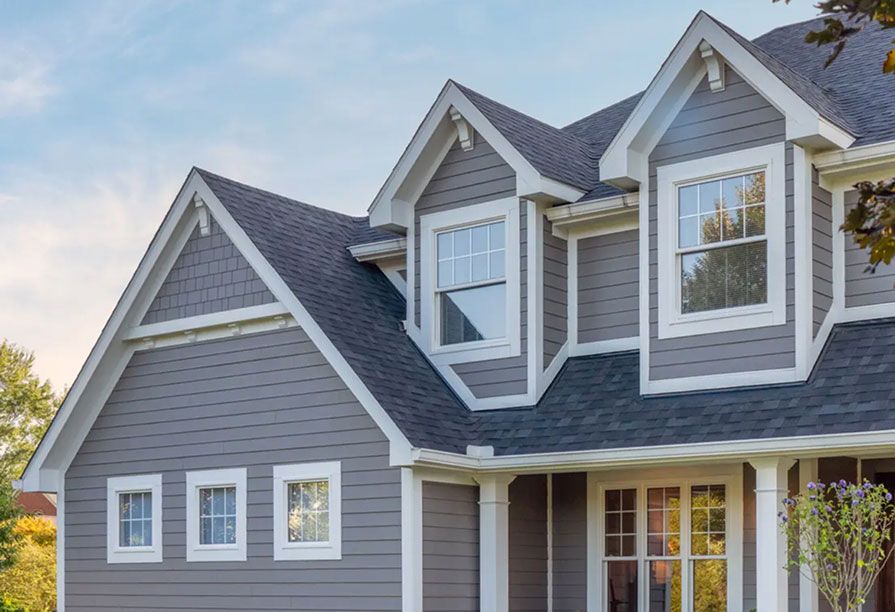 A home featuring James Hardie siding and trim